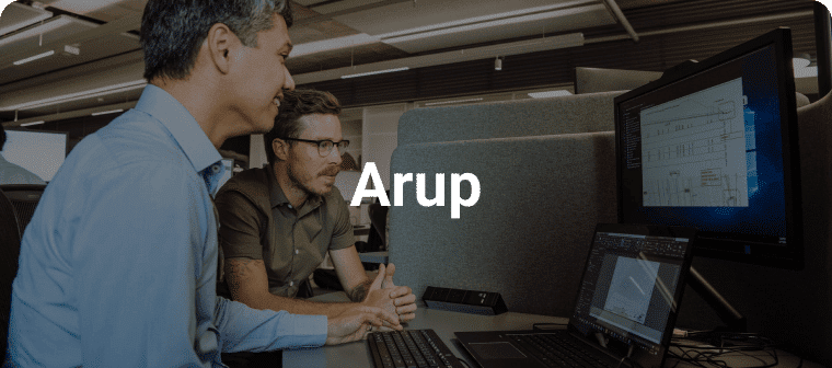 Bluebeam customer Arup text on image of office with men looking at markups on computer screen